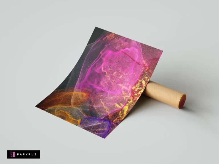 Abstract wall art featuring fluid pink and amber ink swirls with gold metallic details.