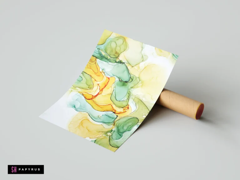 Abstract fluid ink art featuring flowing green and yellow organic shapes and swirling patterns.