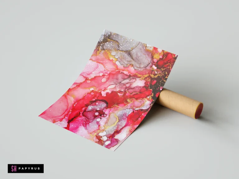 Abstract red and pink alcohol ink marble print with shimmering gold veins.
