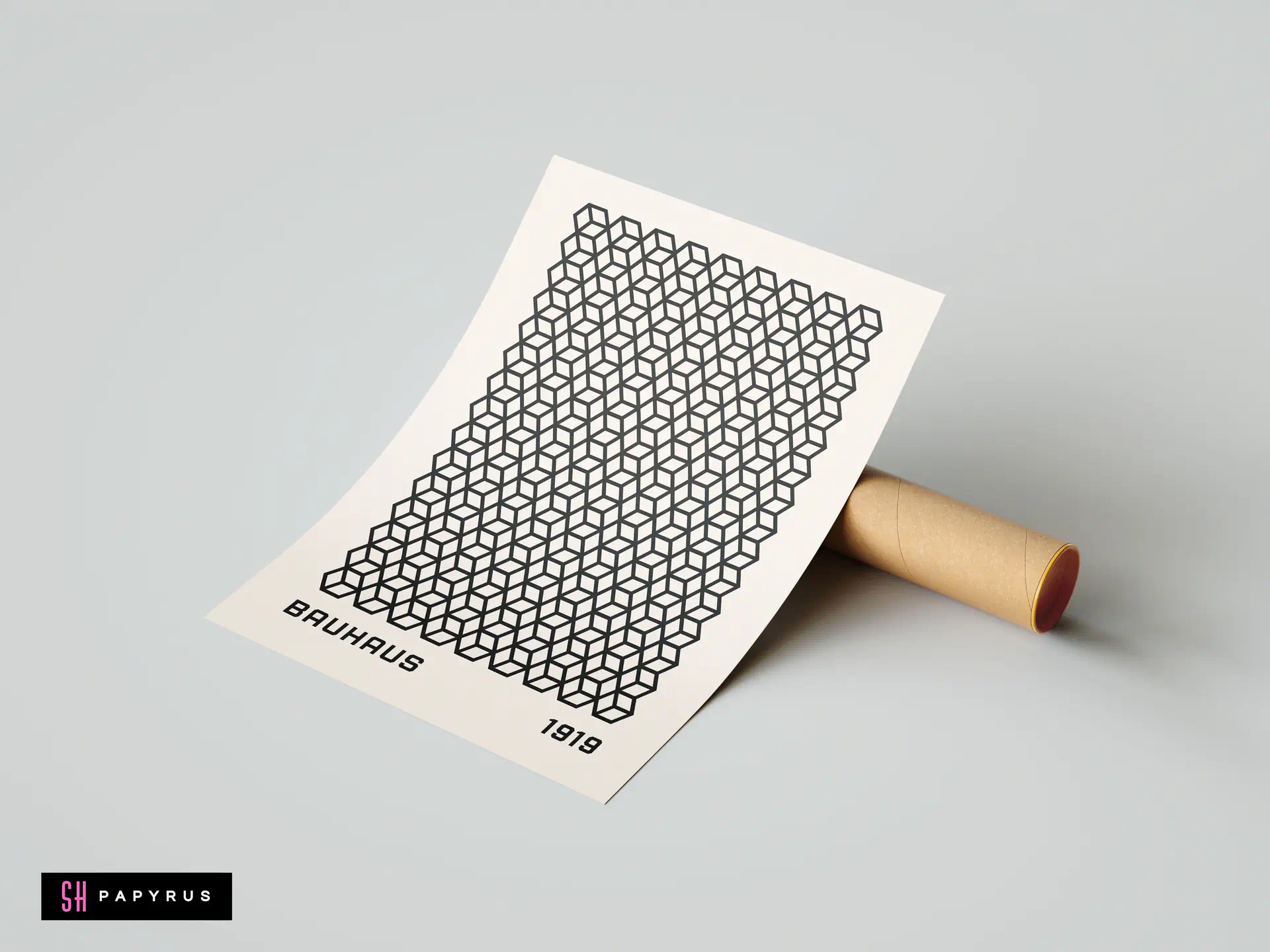 Cream Bauhaus art print with black geometric cubes leaning against a brown mailing tube.