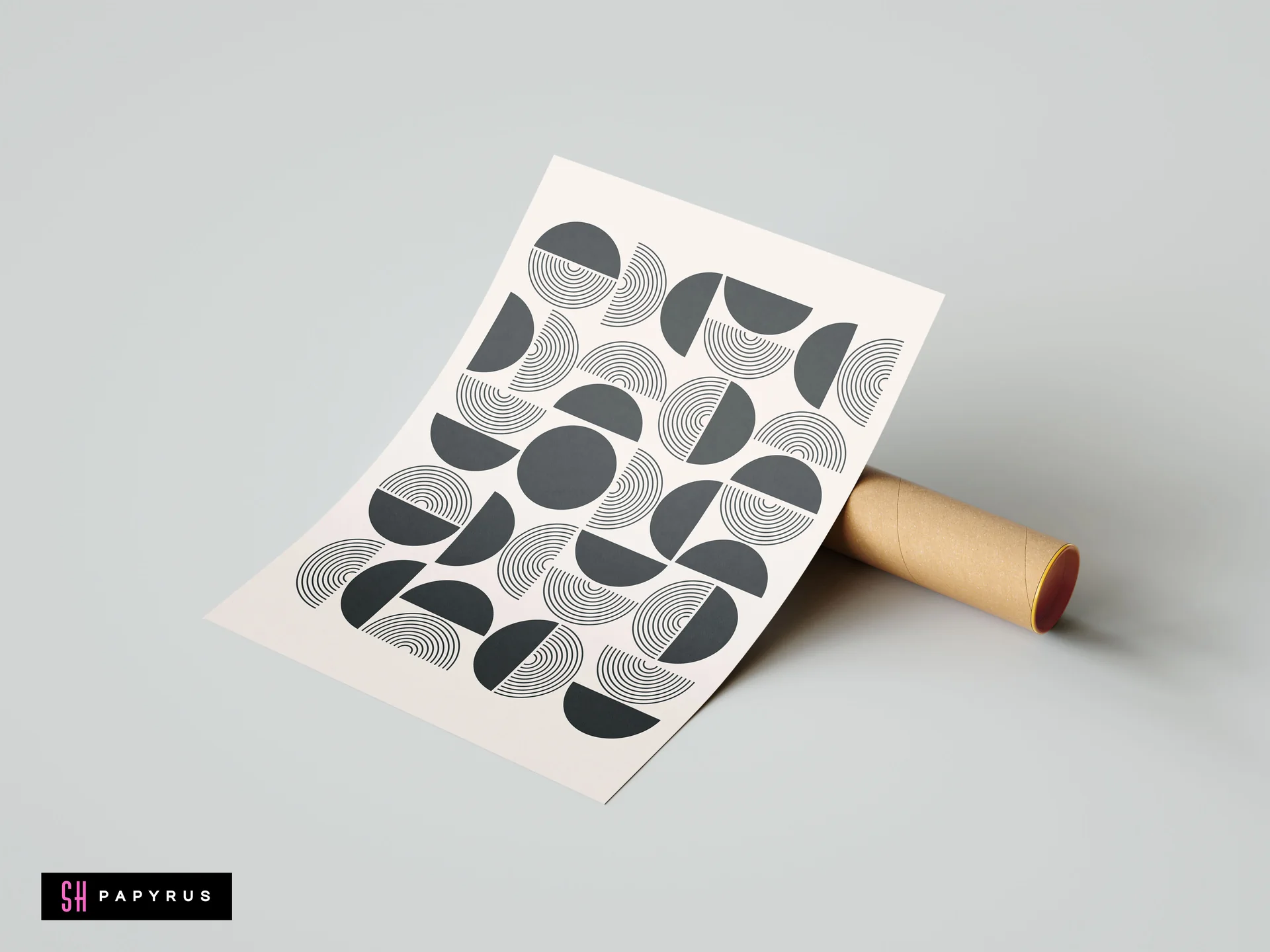 Modern Bauhaus geometric wall art poster with black abstract circles on beige background, displayed resting on a cardboard mailing tube.