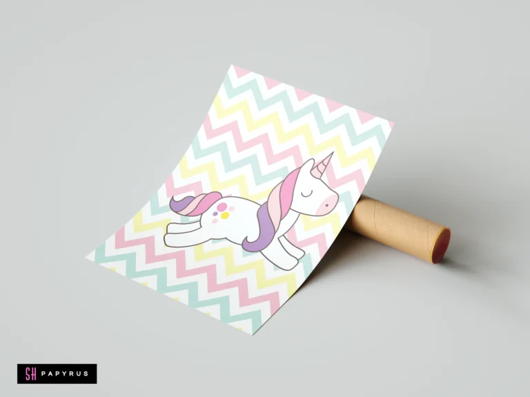 Cartoon white unicorn on a pastel pink, yellow, and green chevron pattern nursery art print.