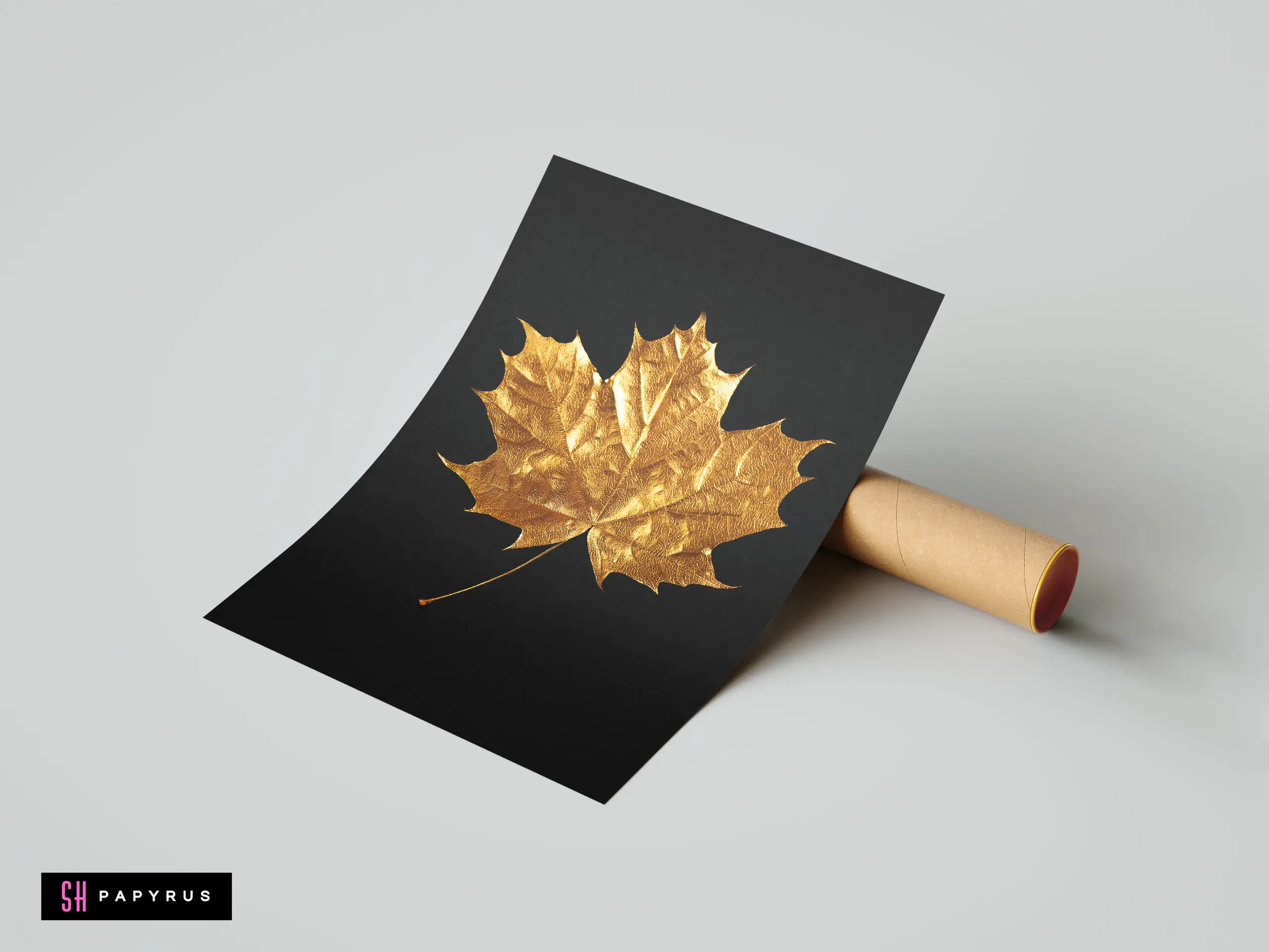 Minimalist art print featuring a textured gold maple leaf on a black background.