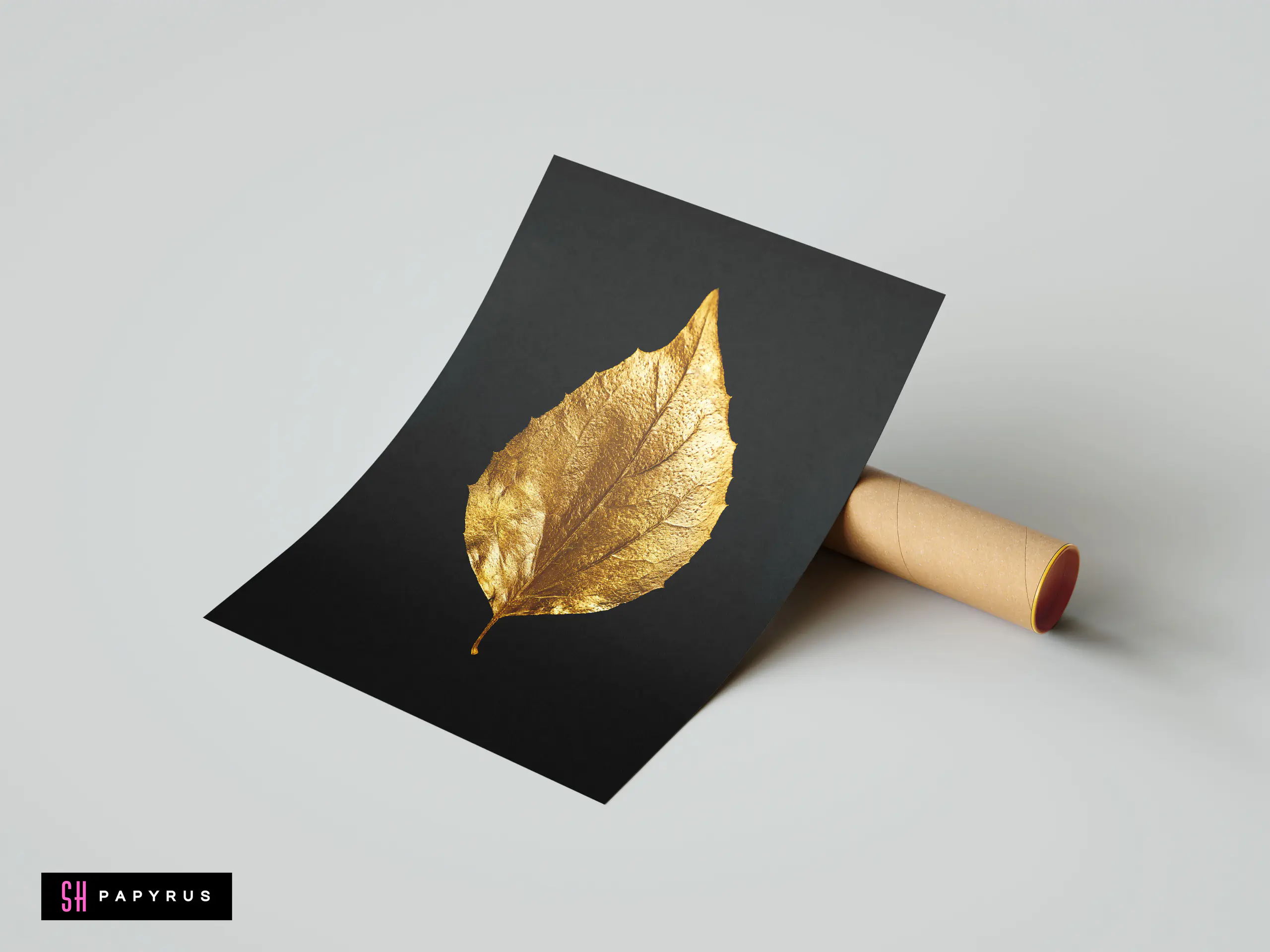 Minimalist macro nature art featuring a detailed textured golden leaf on a black background.