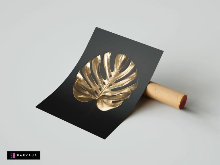 Elegant metallic gold Monstera leaf illustration set against a minimalist matte black background.