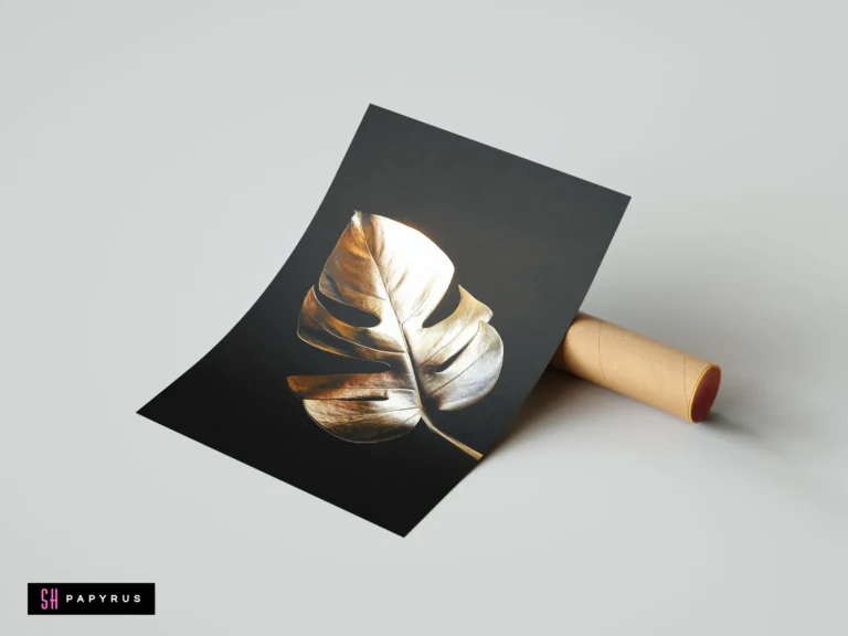 Shimmering gold Monstera leaf botanical art print on a minimalist dark black background.