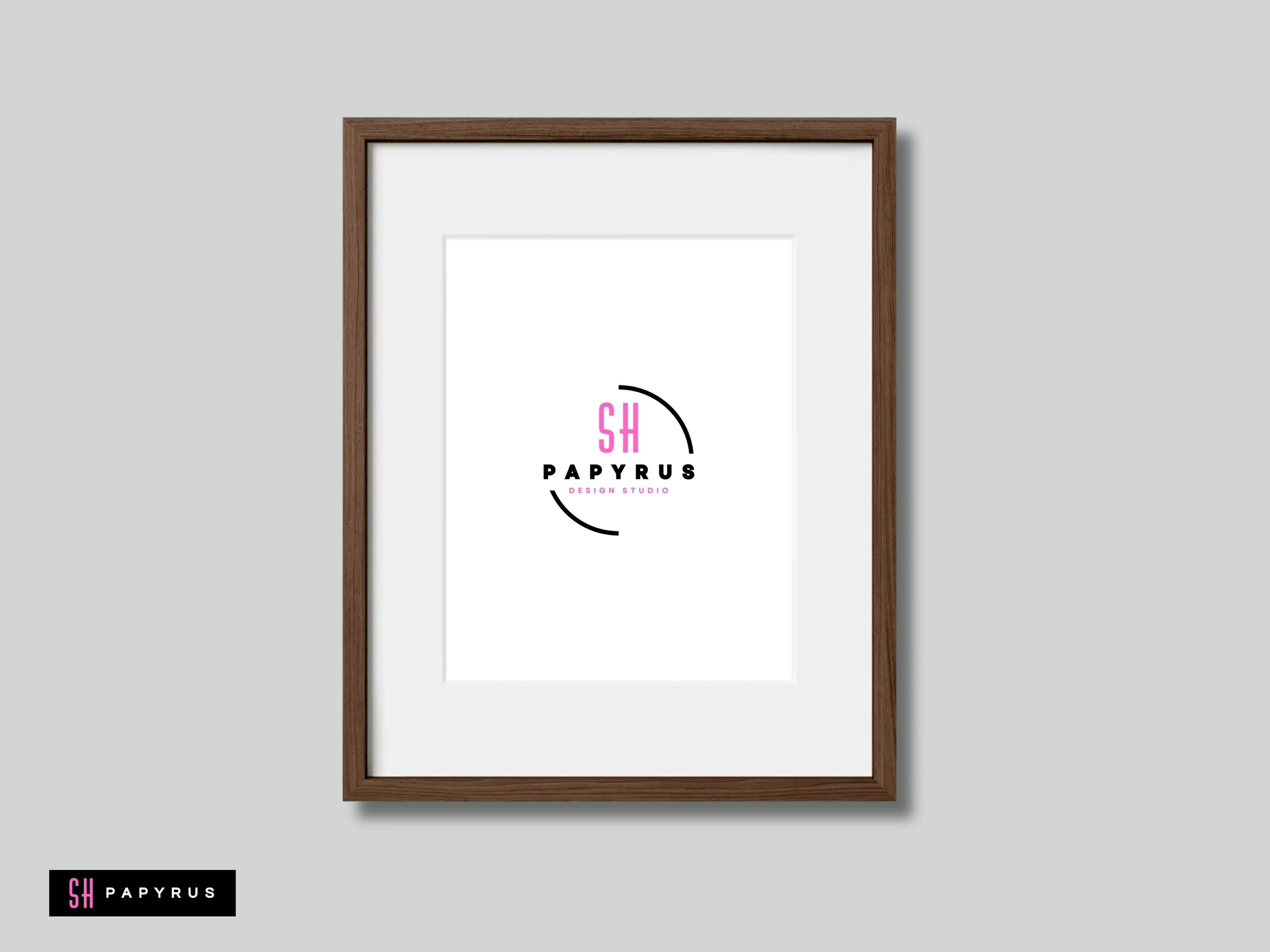 Elegant dark wood framed wall art featuring a pink and black Papyrus logo design.