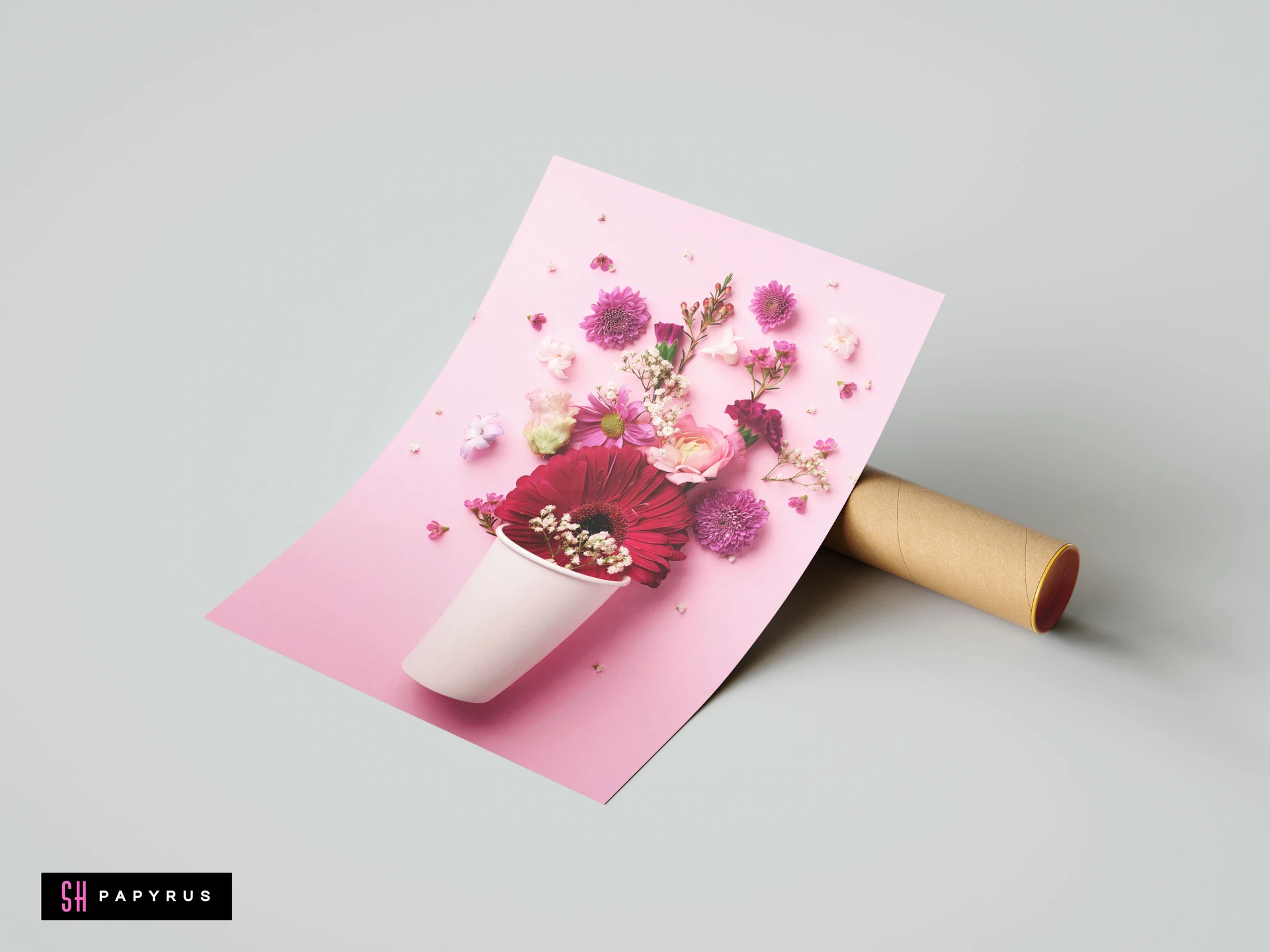 Vibrant pink floral still life wall art featuring magenta flowers bursting from a white cup.